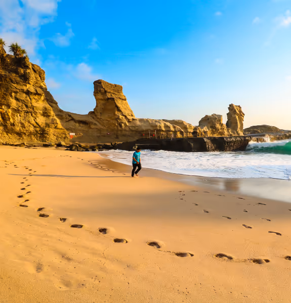 A photo of a man walking on a beach - portraying the steps that Jean will take with your through your counselling journey in Tonbridge and Tunbridge Wells, Kent.
